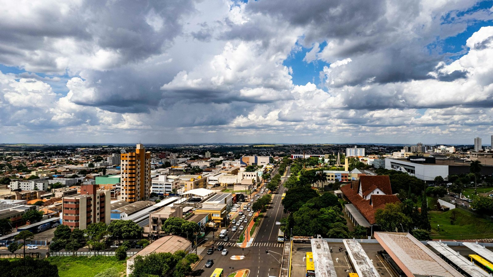 Aerial view of Londrina, Brazil showcasing the cityscape under dramatic clouds.